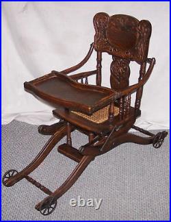 Antique Oak Folding Up and Down High Chair and or Stroller all in one