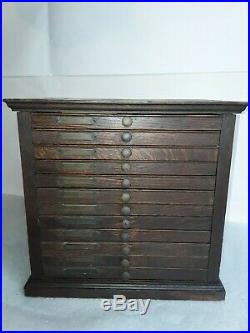 Antique oak dental medical cabinet. Raised panel vintage 12 drawer file c. 1900