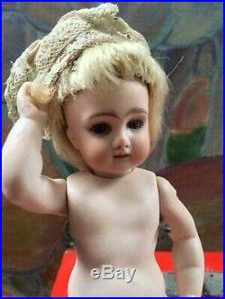 Antique peg-jointed all-bisque doll 4-strap bootines
