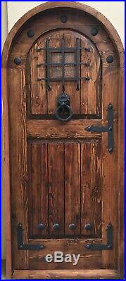 Rustic reclaimed lumber arched door solid wood story book castle winery