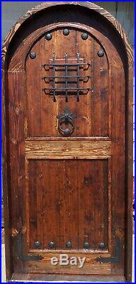 Rustic reclaimed lumber arched door solid wood story book castle winery