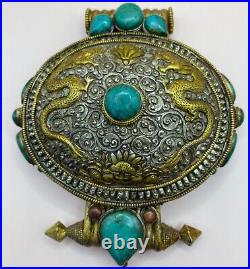 Super antique Nepalese silver and turquoise color stone monks amulet