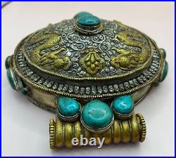 Super antique Nepalese silver and turquoise color stone monks amulet